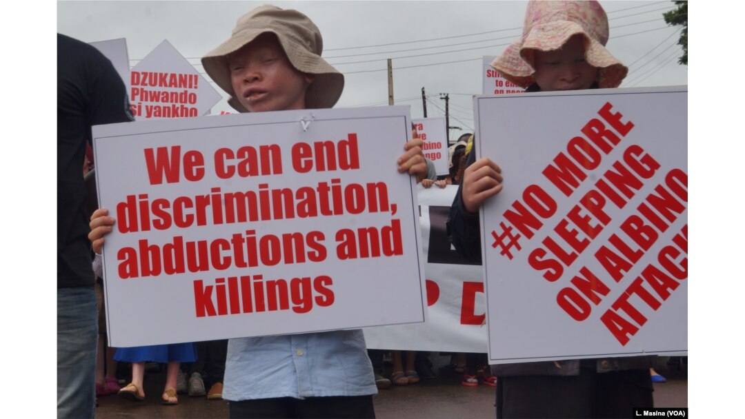 Children were also among the protesters. Some albino children have stopped going to school for fear of attacks.