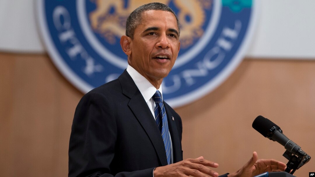 President Barack Obama gestures during a speech at the Belfast Waterfront Hall on June 17, 2013, in Belfast, Northern Ireland.