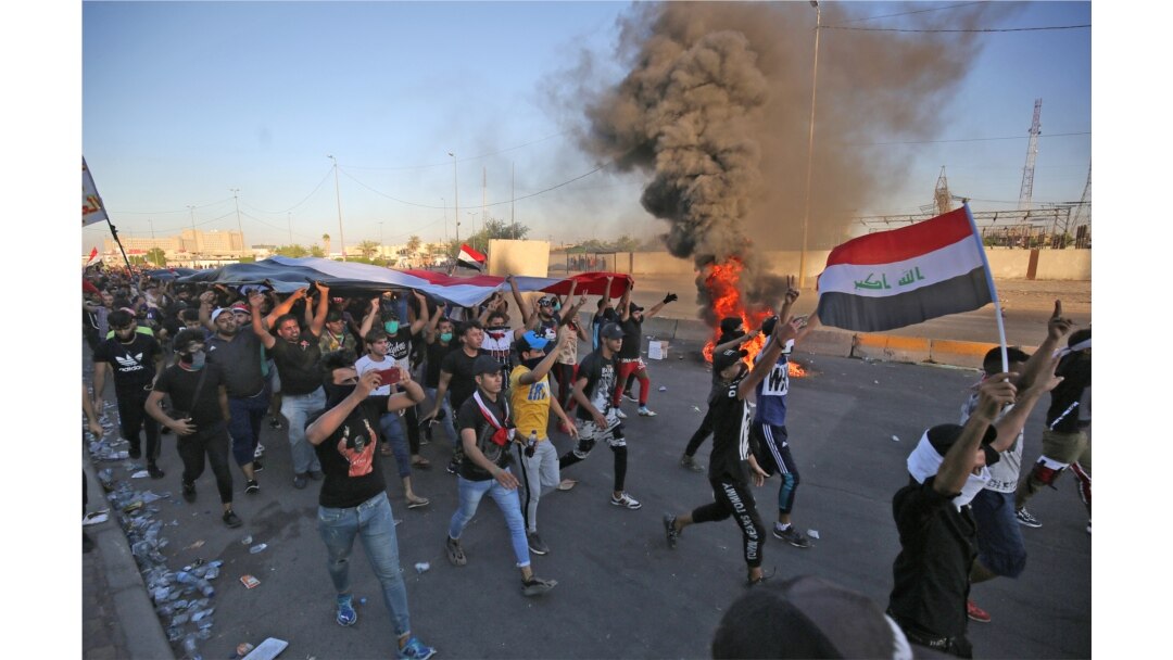 Iraqi protesters take part in a demonstration against state corruption, failing public services, and unemployment, in the Iraqi capital Baghdad's central Khellani Square, Oct. 4, 2019.