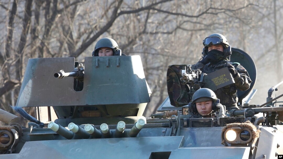FILE - South Korean soldiers ride an armored during an annual exercise in Paju, near the border with North Korea.