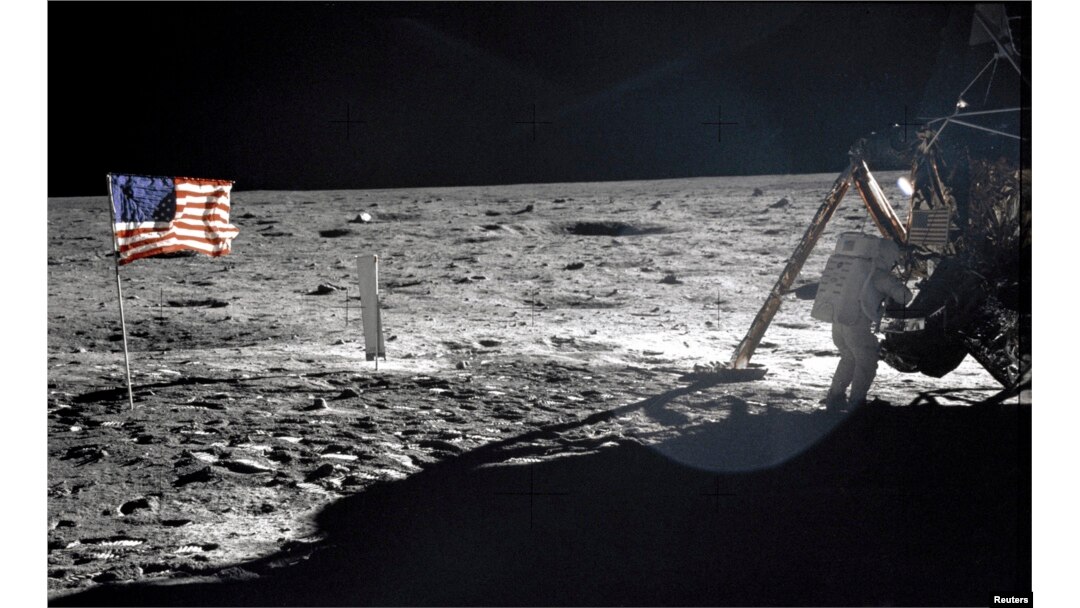 This NASA file image shows U.S. astronaut Neil Armstrong, the Apollo 11 Mission Commander, standing next to the Lunar Module "Eagle" on the moon July 20, 1969.