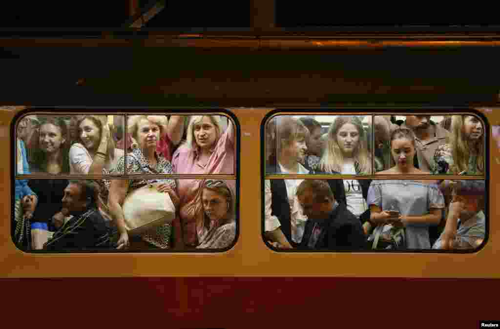 Passengers are seen inside a tram in Kyiv, Ukraine, Sept. 11, 2017.