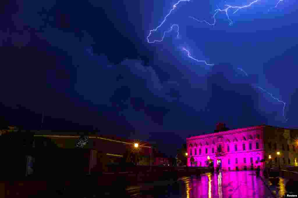 Lightning streaks are seen during a storm over the Auberge de Castille, the office of Prime Minister Joseph Muscat, in Valletta, Malta.