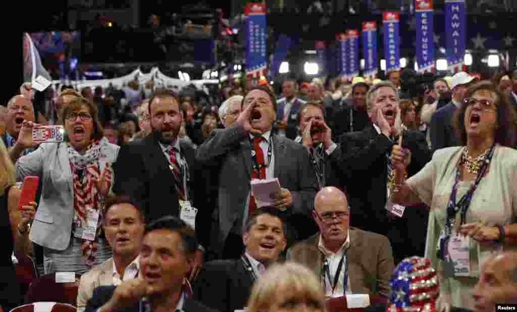 Republican National Convention delegates yell as the Republican National Committee Rules Committee announces it will not hold a recorded vote on the Rules Committee's Report, and rejects the efforts of anti-Trump forces to hold a roll-call vote, at the Republican National Convention in Cleveland, Ohio, July 18, 2016.