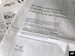 An advertisement in The New York Times is displayed on Sunday, March 25, 2018, in New York. Facebook’s CEO apologized for the Cambridge Analytica scandal with ads in multiple U.S. and British newspapers.