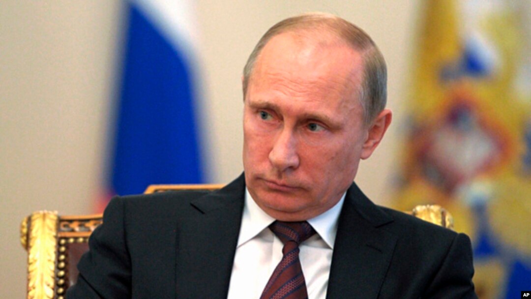 Russia's President Vladimir Putin during a meeting with Russian Parliament speakers at the Novo-Ogaryovo residence outside Moscow, Sept. 2, 2013.