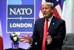 President Donald Trump speaks as he meets with Italian Prime Minister Giuseppe Conte (not pictured) during the NATO summit at The Grove, in Watford, England. Dec. 4, 2019.