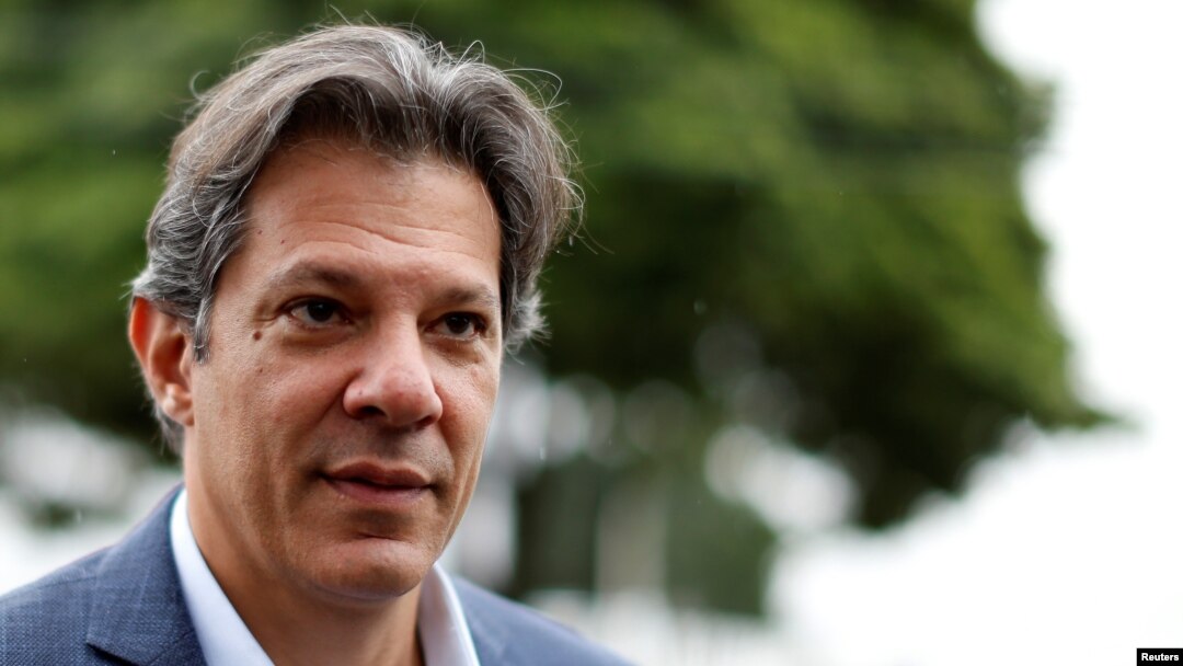 Workers Party vice presidential candidate Fernando Haddad, leaves the Federal Police headquarters, where Brazilian former President Luiz Inacio Lula da Silva is imprisoned, after visiting him, in Curitiba, Brazil, Sept. 3, 2018.