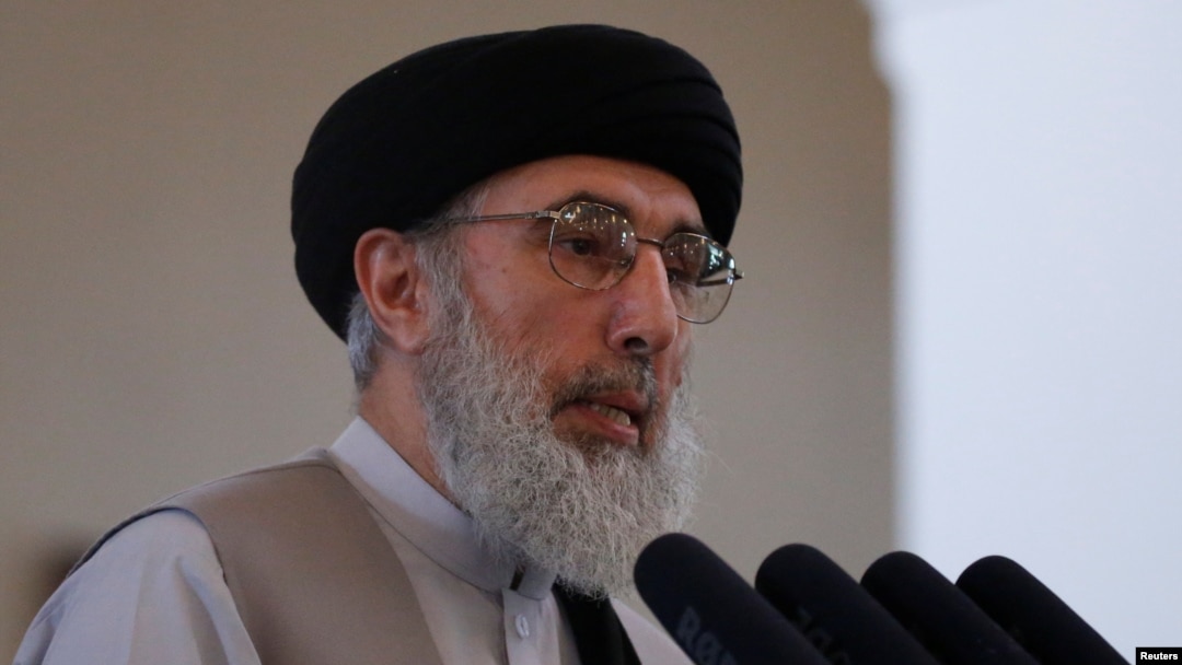 FILE - Afghan warlord Gulbuddin Hekmatyar speaks at the presidential palace in Kabul, Afghanistan, May 4, 2017. 