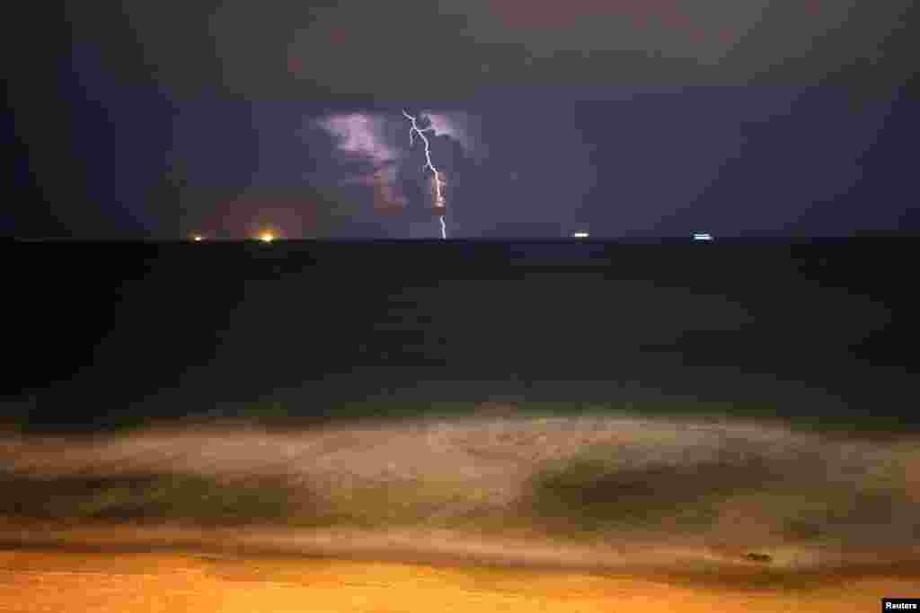 Lightning strikes over the Mediterranean sea during a rain storm near the city of Ashkelon, Israel Nov. 14, 2018.
