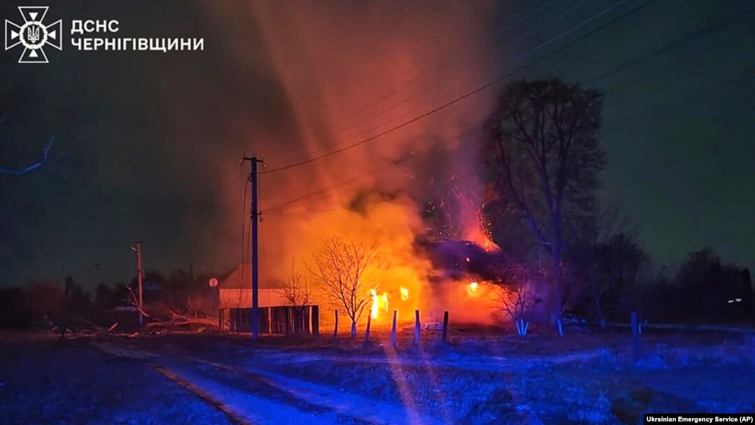 Buildings burn after a Russian drone attack in Chernihiv region, Ukraine, Dec. 13, 2024.