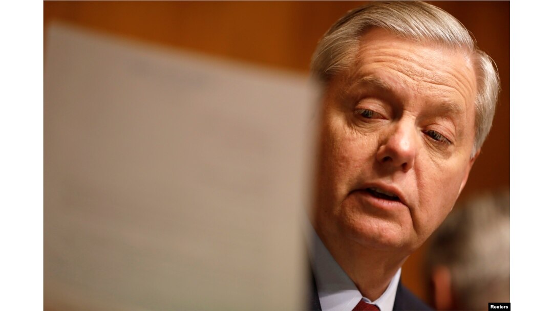 FILE - Chairman Sen. Lindsay Graham (R-SC) reads a letter on Capitol Hill in Washington, March 15, 2017.