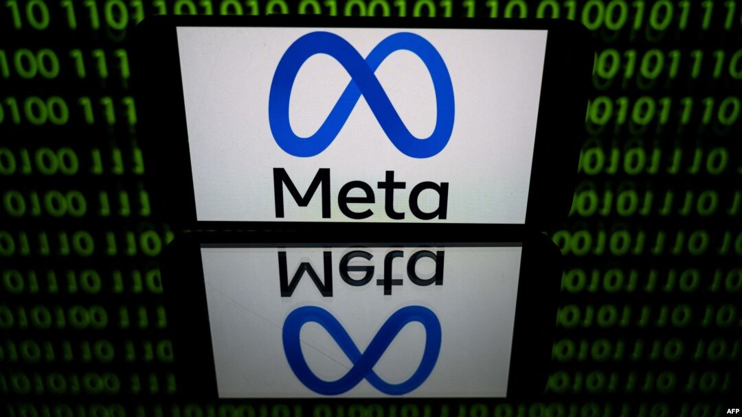 FILE - This picture taken on Jan. 12, 2023, in Toulouse, France, shows a tablet displaying the logo of the company Meta. The company is reportedly planning to offer European users subscription-based versions of Instagram and Facebook.