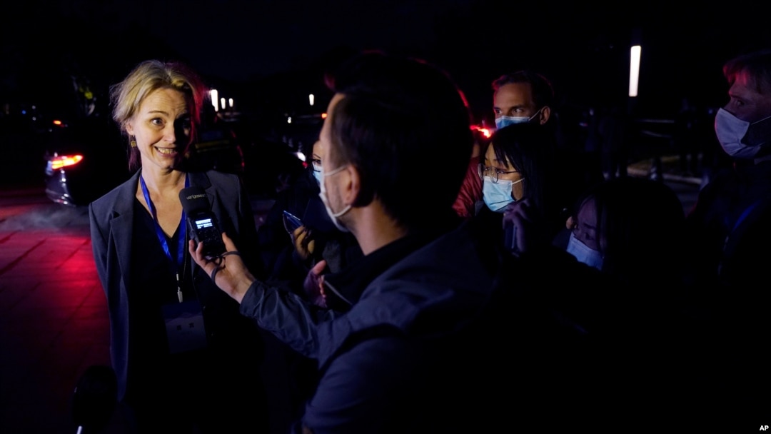 Thea Fischer of the World Health Organization team speaks to journalists outside after a WHO-China Joint Study Press Conference held at the end of the WHO mission in Wuhan, China, Feb. 9, 2021.
