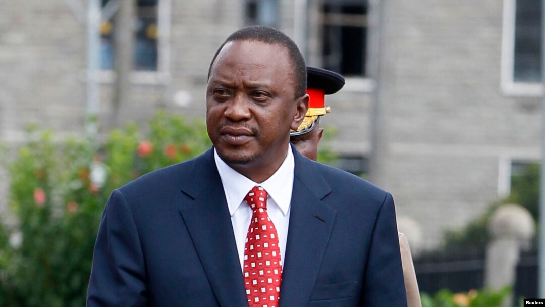 Kenya's President Uhuru Kenyatta prepares to inspect a guard of honor before the opening of the 11th Parliament at the National Assembly Chamber in Nairobi, April 16, 2013.