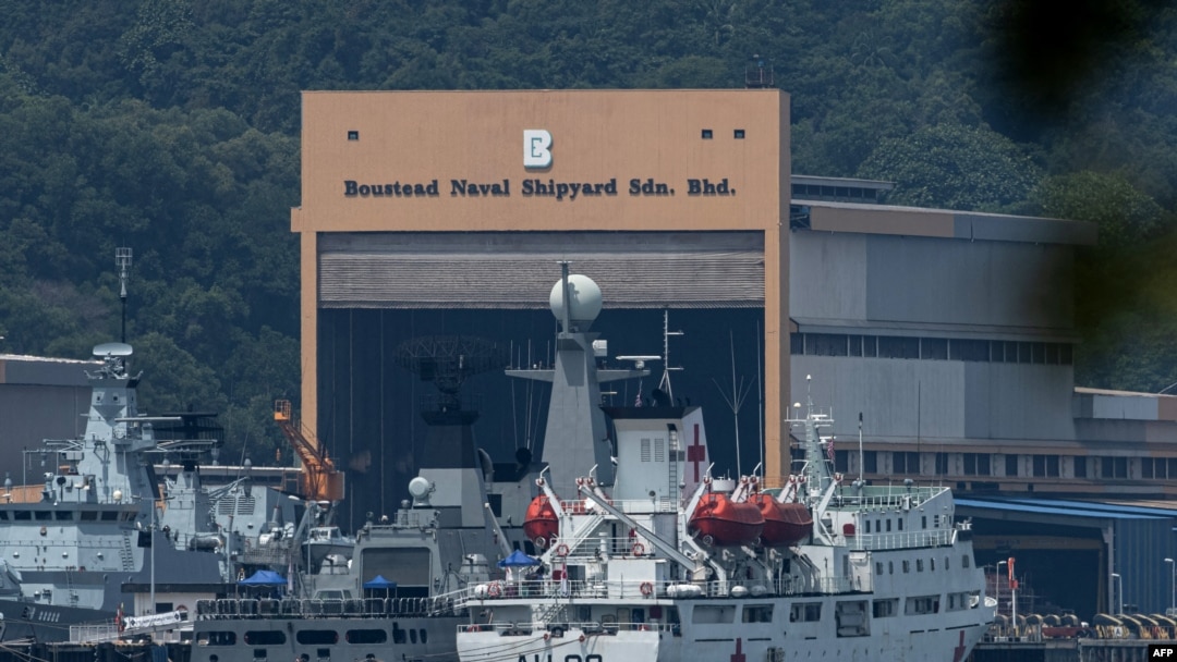 Myanmar vessels UMS Than Lwin (R) and UMS Sin Phyu Shin, which will be used to deport Myanmar migrants from Malaysia back to their homeland, are seen docked at a jetty in Lumut, outside Kuala Lumpur, Feb. 22, 2021. 