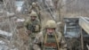 Biden Warns Putin on Russian Troop Buildup Near Ukraine