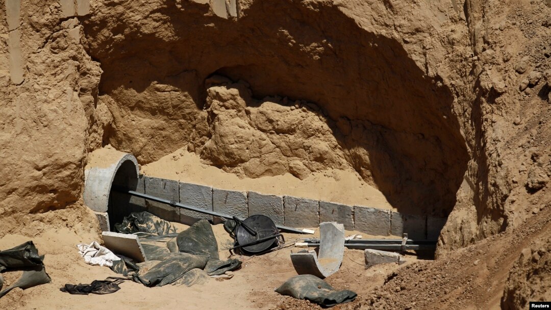 FILE - Part of a tunnel exposed by the Israeli military is seen on the Israeli side of the Israel-Gaza border, Aug. 14, 2014. During a 2014 operation, Israel destroyed 34 such tunnels, a military spokeswoman said.