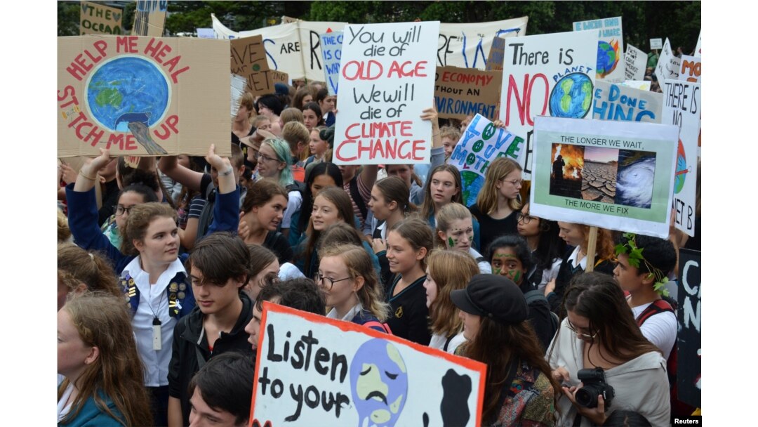 Students are seen during the global school strike for action on climate change outside New Zealand's parliament in Wellington, New Zealand, March 15, 2019.