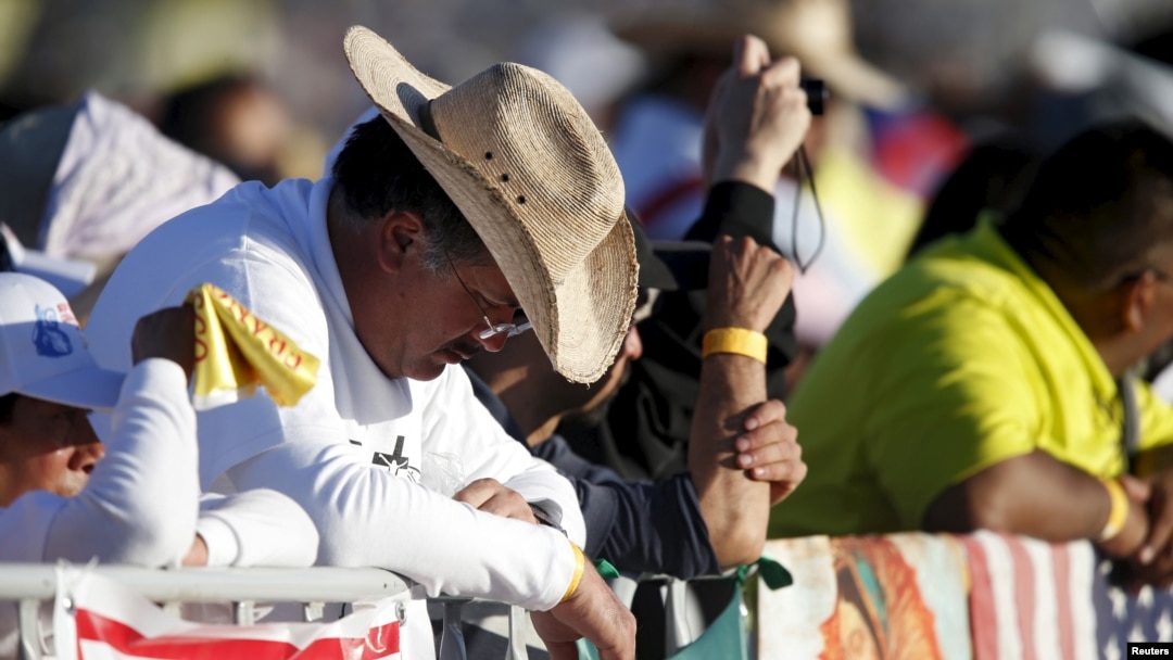People attend the Mass celebrated by Pope Francis in Ciudad Juarez, Mexico, Feb. 17, 2016.