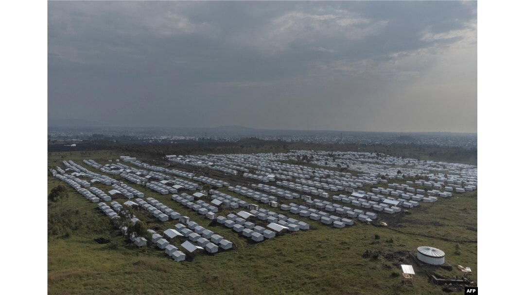 The new arrivals were forced from homes farther north by the advancing M23 militia, which resumed fighting in November 2021 after accusing the Congolese government of failing to honor an agreement to incorporate its fighters into the army. (This aerial view shows the internally displaced persons camp in Bushagara, north of the city of Goma in eastern Democratic Republic of Congo, Jan. 13, 2023.)
