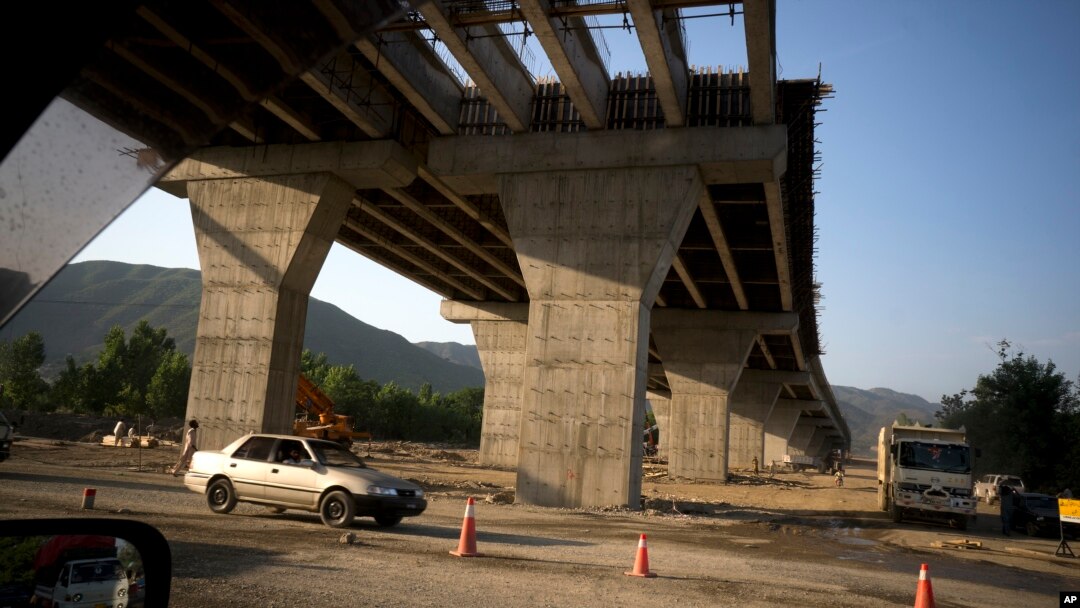 FILE - Work continues on a new international trade route near Havalian in Pakistan, May 11, 2017. The work is part of a sprawling Chinese initiative to build a "new Silk Road" of ports, railways and roads across Asia, Africa and Europe.