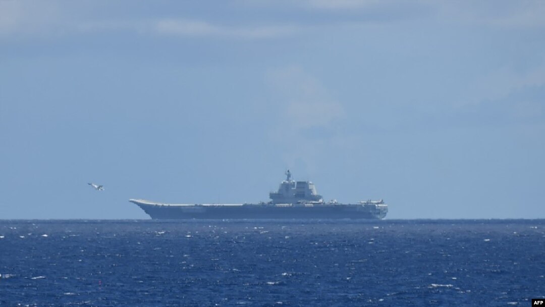 FILE - This handout photo taken on July 9, 2024 and released on July 10 by Japan's Ministry of Defense shows the Chinese navy's aircraft carrier Shandong in the Pacific Ocean southeast of Miyakojima, Okinawa prefecture.