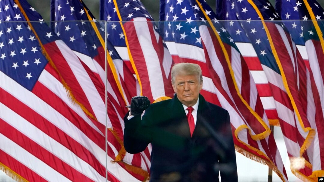 FILE - Then-President Donald Trump arrives to speak at a rally in Washington, Jan. 6, 2021.