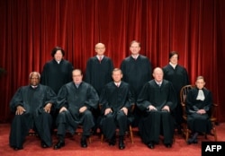 The Justices of the US Supreme Court sit for their official photograph on October 8, 2010 at the Supreme Court in Washington, DC, October 8, 2010.