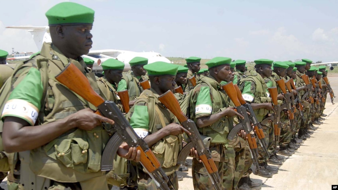 Part of the 3 battalion of the Uganda People's Defence Force prepare to leave for African Union peace keeping in Magadishu, Somalia, Friday Sept. 4. 2009, in Entebbe, Uganda. Uganda has sent another group of soldiers to Somalia for a peace keeping mission