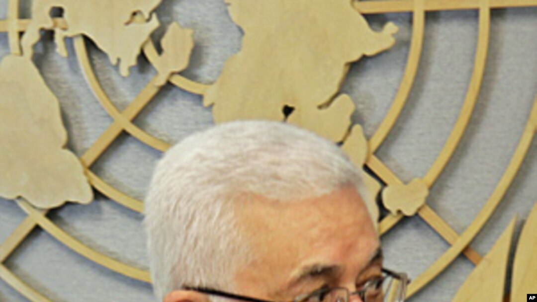 Palestinian President Mahmoud Abbas arrives for a meeting with United Nations Secretary-General Ban Ki-moon at UN headquarters, Sept. 19, 2011
