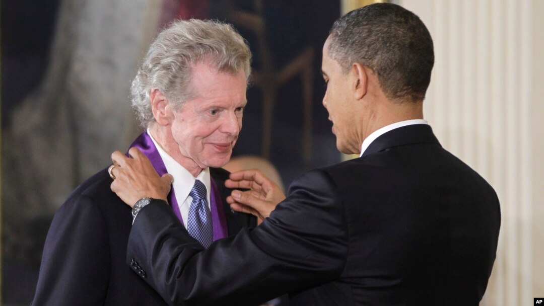 President Barack Obama presents a 2010 National Medal of Arts to pianist Van Cliburn, March 2, 2011, during a ceremony in the East Room of the White House in Washington.