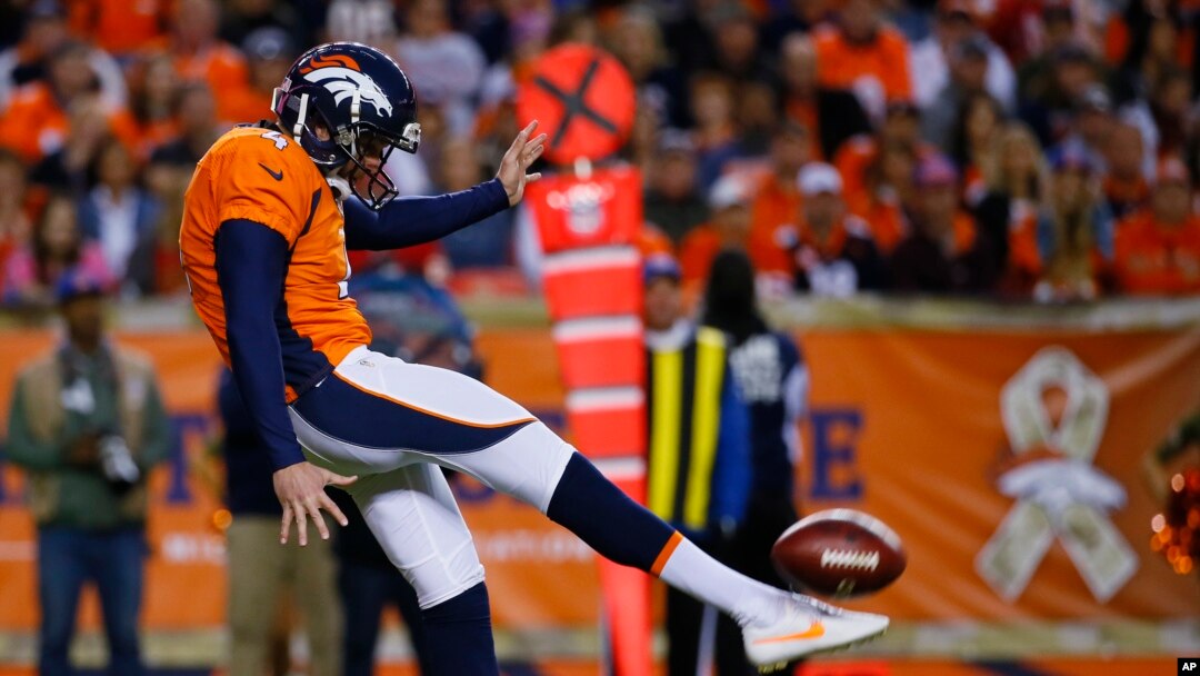 Denver Broncos punter Britton Colquitt punts during an NFL football game between the Denver Broncos and the Kansas City Chiefs.