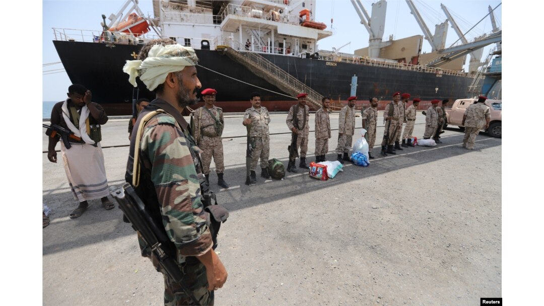 FILE - Yemen's Houthi movement forces are seen during withdrawal from Saleef port in Hodeidah province, Yemen, May 11, 2019.