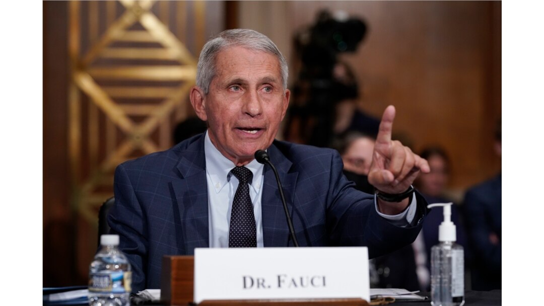 FILE - Dr. Anthony Fauci responds to accusations by Sen. Rand Paul, R-Ky., as he testifies before the Senate Health, Education, Labor, and Pensions Committee, on Capitol Hill in Washington, July 20, 2021.