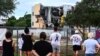 After mass killings, complex question follows: Demolish, or press on?