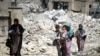 Families fleeing are starving and crying out for water as they reach Iraqi forces in Mosul, July 5, 2017. (H. Murdock/VOA)