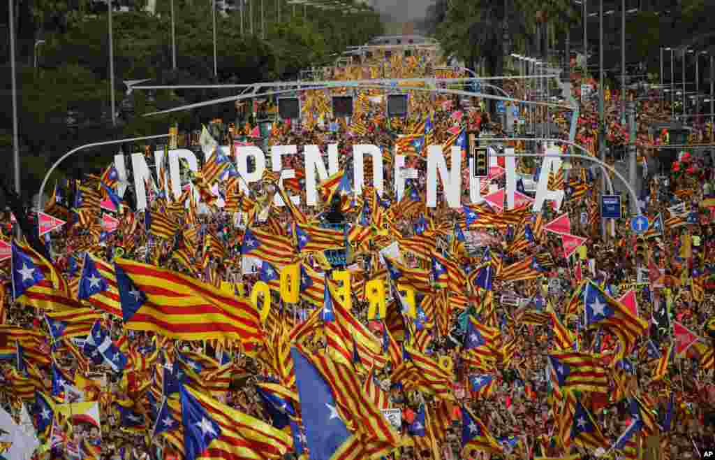 Pro-independence demonstrators fill up La Diagonal, one of Barcelona's main avenues, during the Catalan National Day in Barcelona, Spain.