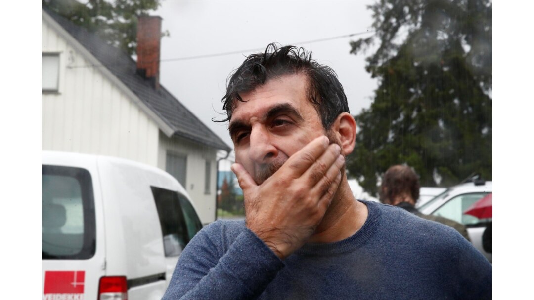 Mosque board member Irfan Mushtaq reacts after a shooting in al-Noor Islamic center mosque, near Oslo, Norway, Aug. 10, 2019.