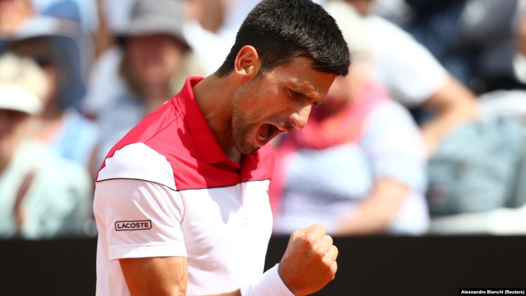 Novak Đoković slavi osvajanje poena u meču drugog kola na turnru u Rimu, prtotiv Gruzijca Nikolosa Bazilašvilija (Foto: Reuters/Alessandro Bianchi)