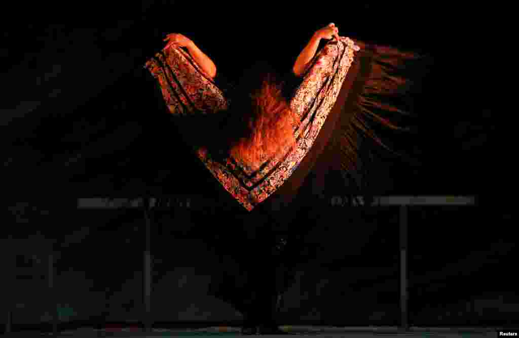 Flamenco dancer Rocio Molina performs during a rehearsal of her work "Grito Pelao" as part of the Bienal of Flamenco in Seville, Spain. The Bienal is the world's largest Flamenco festival and will run until September 30.