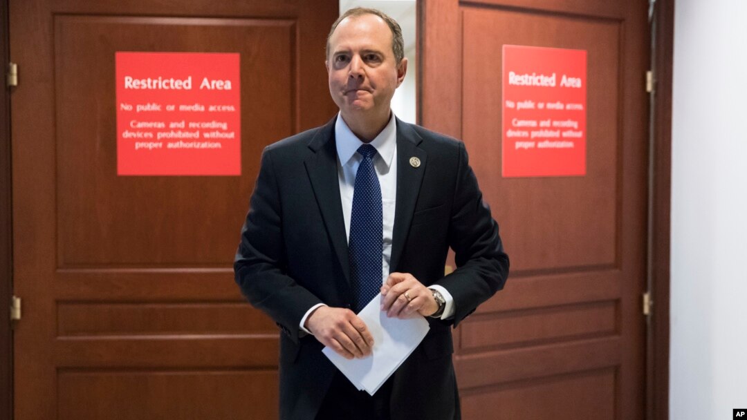 FILE - Rep. Adam Schiff, D-Calif., ranking member of the House Permanent Select Committee on Intelligence, leaves a secure area where the panel meets as Democrats seek to push back against a classified memo released by Republicans last week .