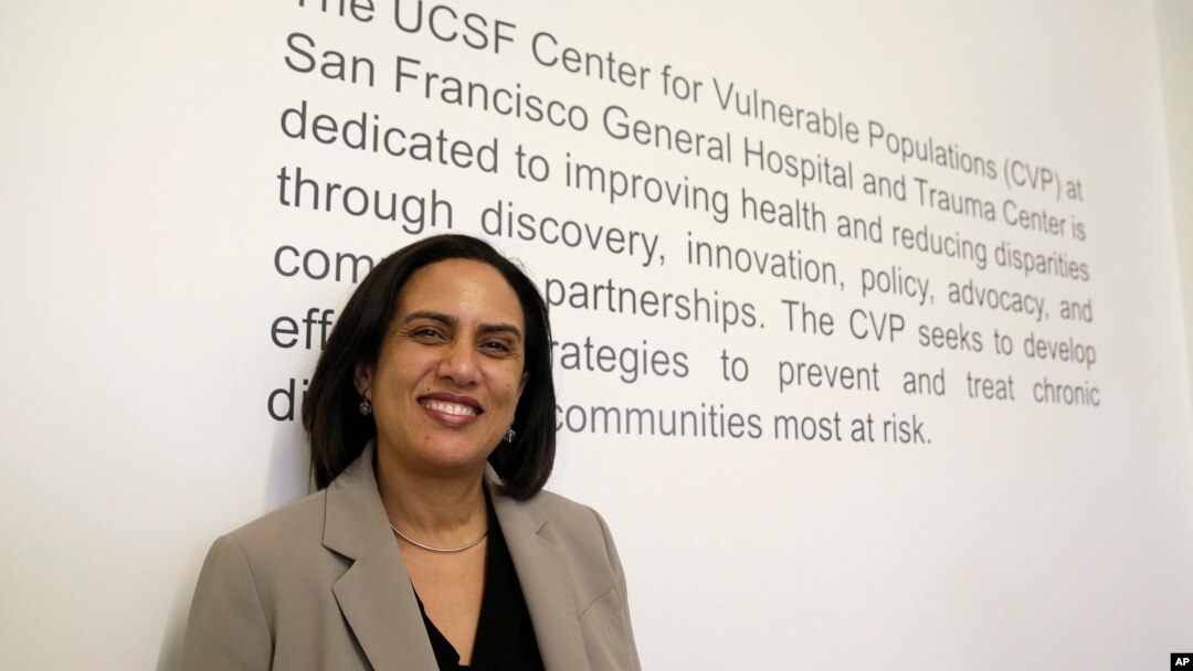 FILE - Dr. Kirsten Bibbins-Domingo poses at her office in San Francisco, April 7, 2017. Draft recommendations from the U.S. Preventive Services Task Force ditch the old advice against PSA screening and say whether to get tested should be left up to men aged aged 55 to 69 after being informed of the potential benefits and harms. 