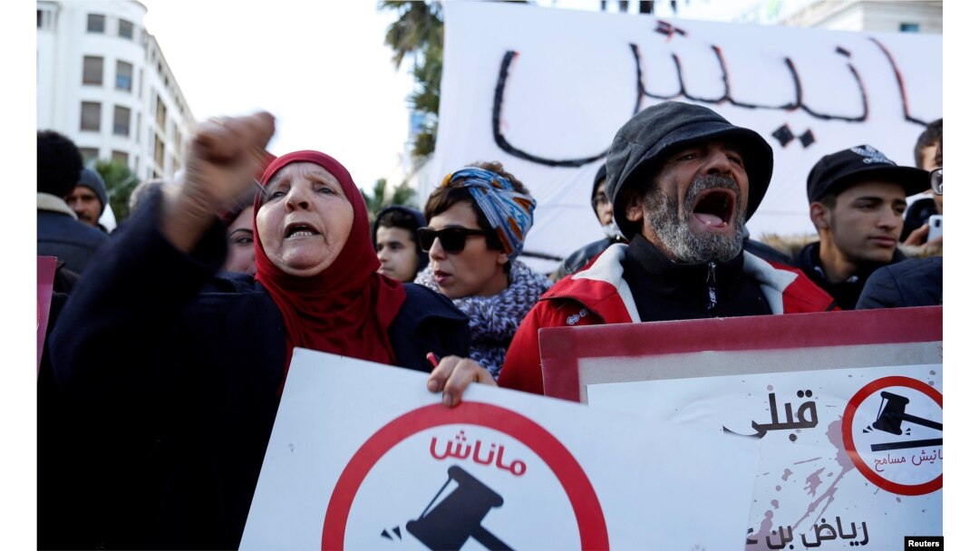 Protesters shout slogans against rising prices and tax increases in Tunis, Tunisia, Jan. 13, 2018.