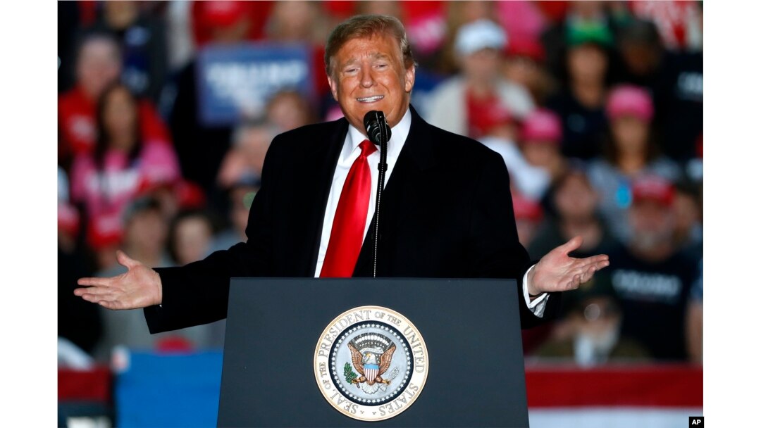 FILE - President Donald Trump speaks during a rally at Southern Illinois Airport in Murphysboro, Illinois.