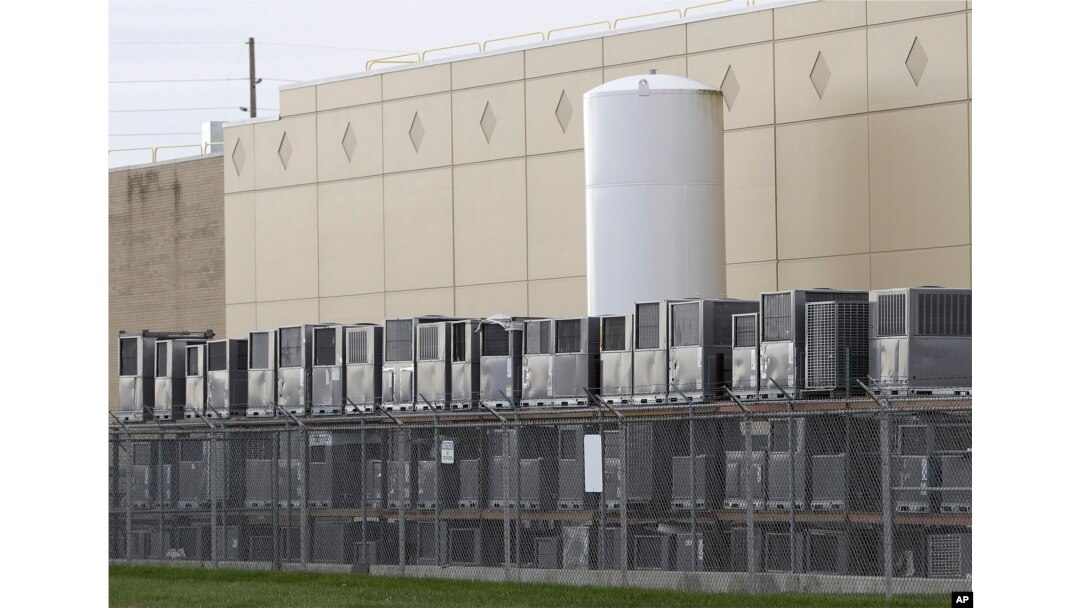 Air conditioning units are stacked outside the Carrier Corp. plant, in Indianapolis, Nov. 30, 2016.