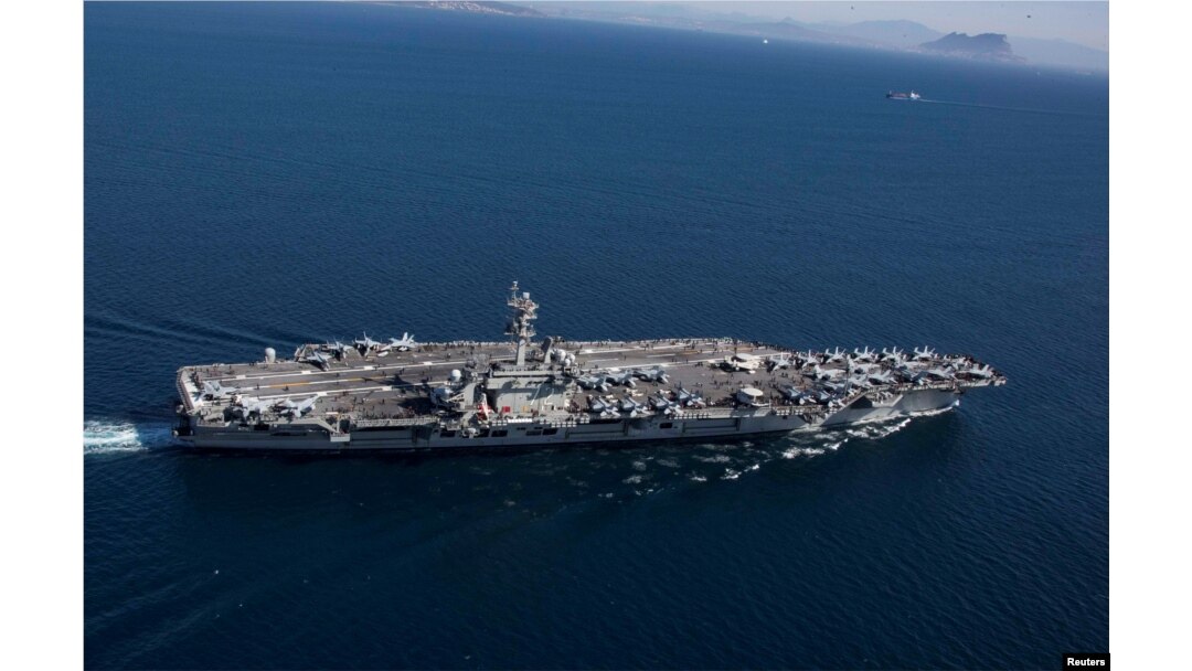 The Nimitz-class aircraft carrier USS Abraham Lincoln transits the Strait of Gibraltar, entering the Mediterranean Sea as it continues operations in the 6th Fleet area of responsibility, April 13, 2019.