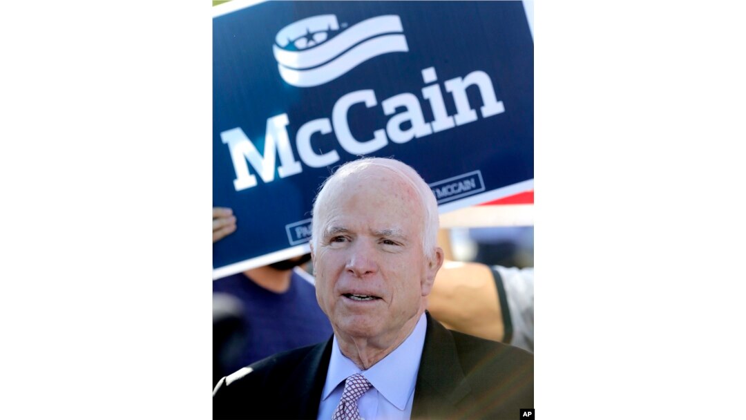 FILE - U.S. Sen. John McCain, R-Ariz., speaks outside a polling station after voting, Aug. 30, 2016, in Phoenix.