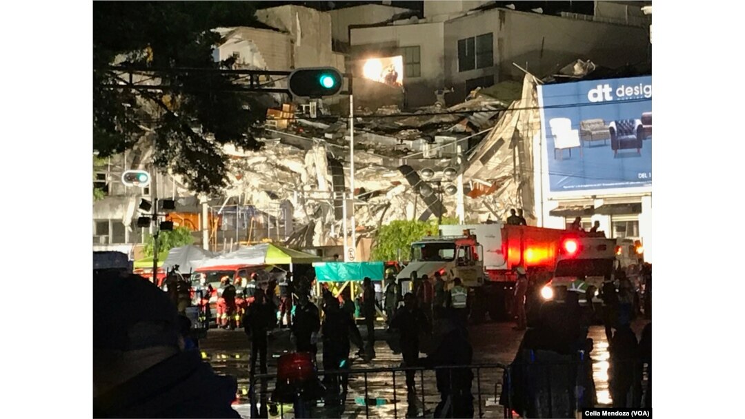 Colonia Roma its one of the areas of Mexico City greatly affected by the earthquake, Sept. 19, 2017. This is an office building where rescuers are trying to get people out of the rubble. Three people were take out alive Wednesday.