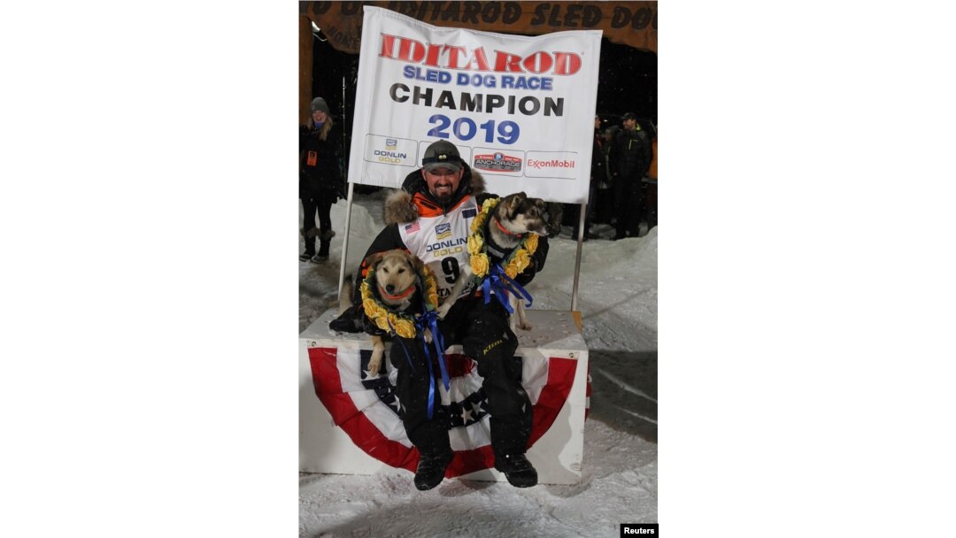 Pete Kaiser of of Bethel, Alaska poses after winning the Iditarod Trail Sled Dog Race after crossing the finish line in Nome, Alaska, U.S. March 13, 2019. REUTERS/Diana Haecker/Nome Nugget